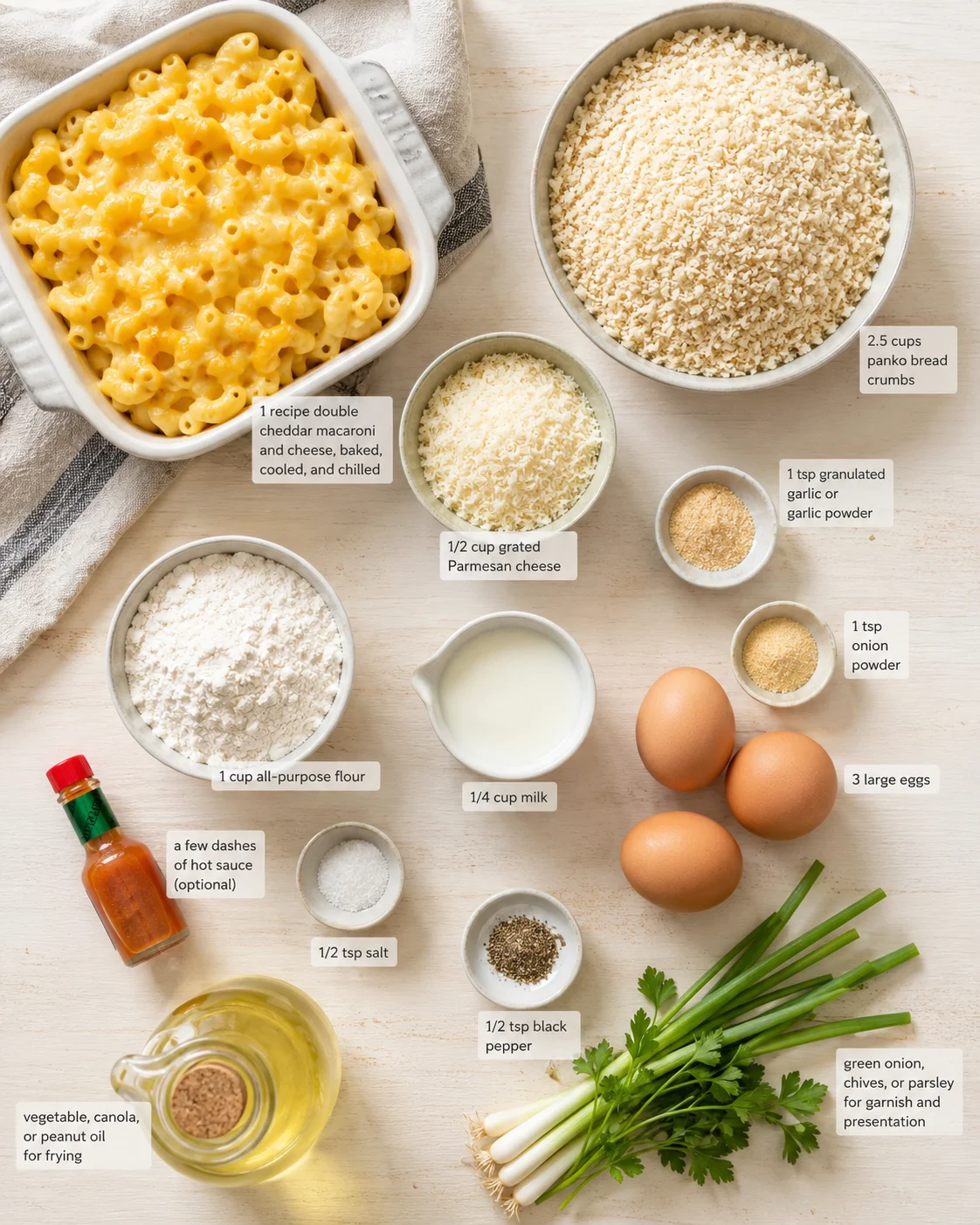 overhead shot of baked macaroni and cheese with bowls of ingredients on a light wooden surface