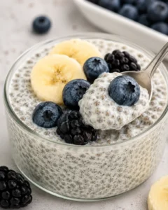 Creamy vanilla chia pudding topped with blueberries and banana slices.