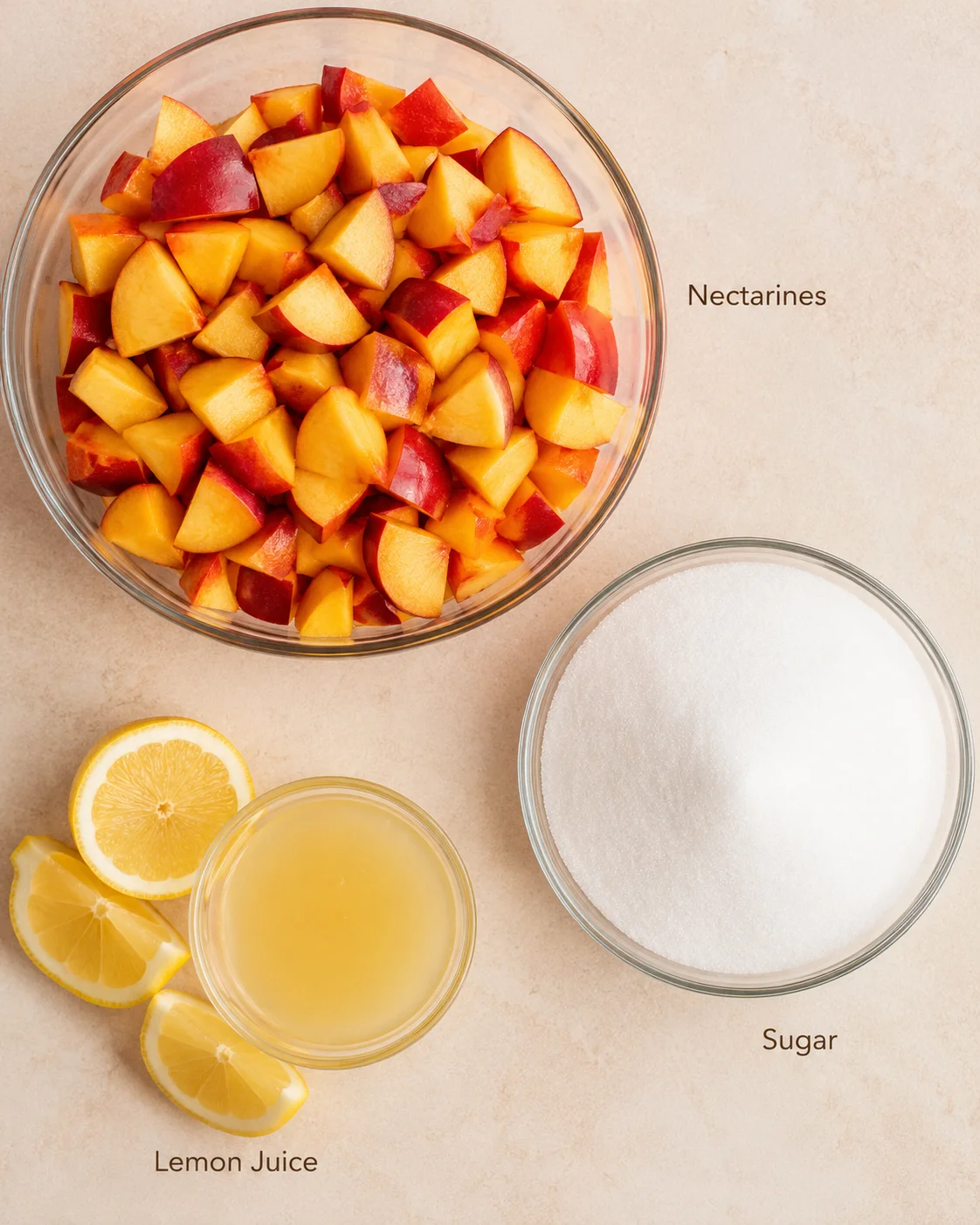 Chopped ripe nectarines, sugar, and lemon juice for making jam.