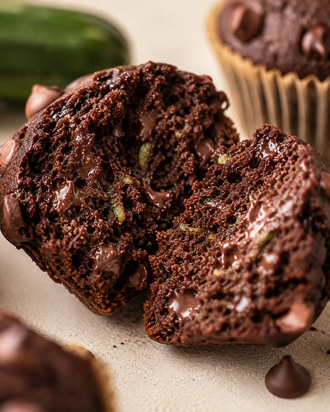 Vegan Chocolate Zucchini Muffins Close-up of moist, chocolate-filled vegan zucchini muffins with bakery-style tops.