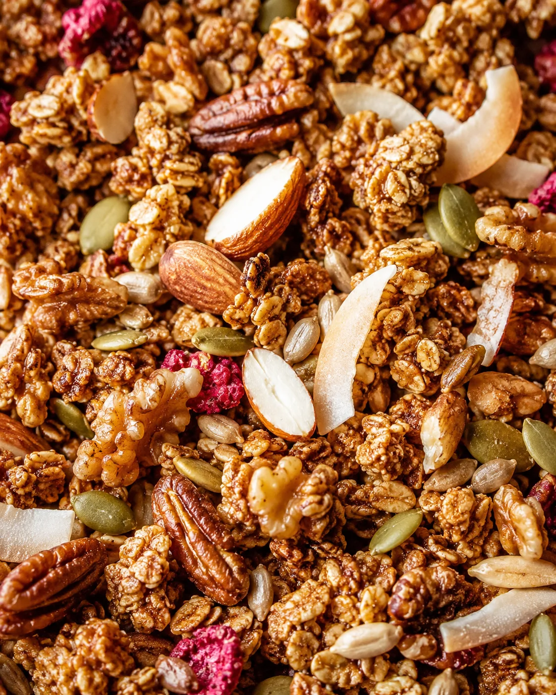 Crunchy Low Carb Keto Granola Close-up of homemade keto granola with nuts and coconut chips.