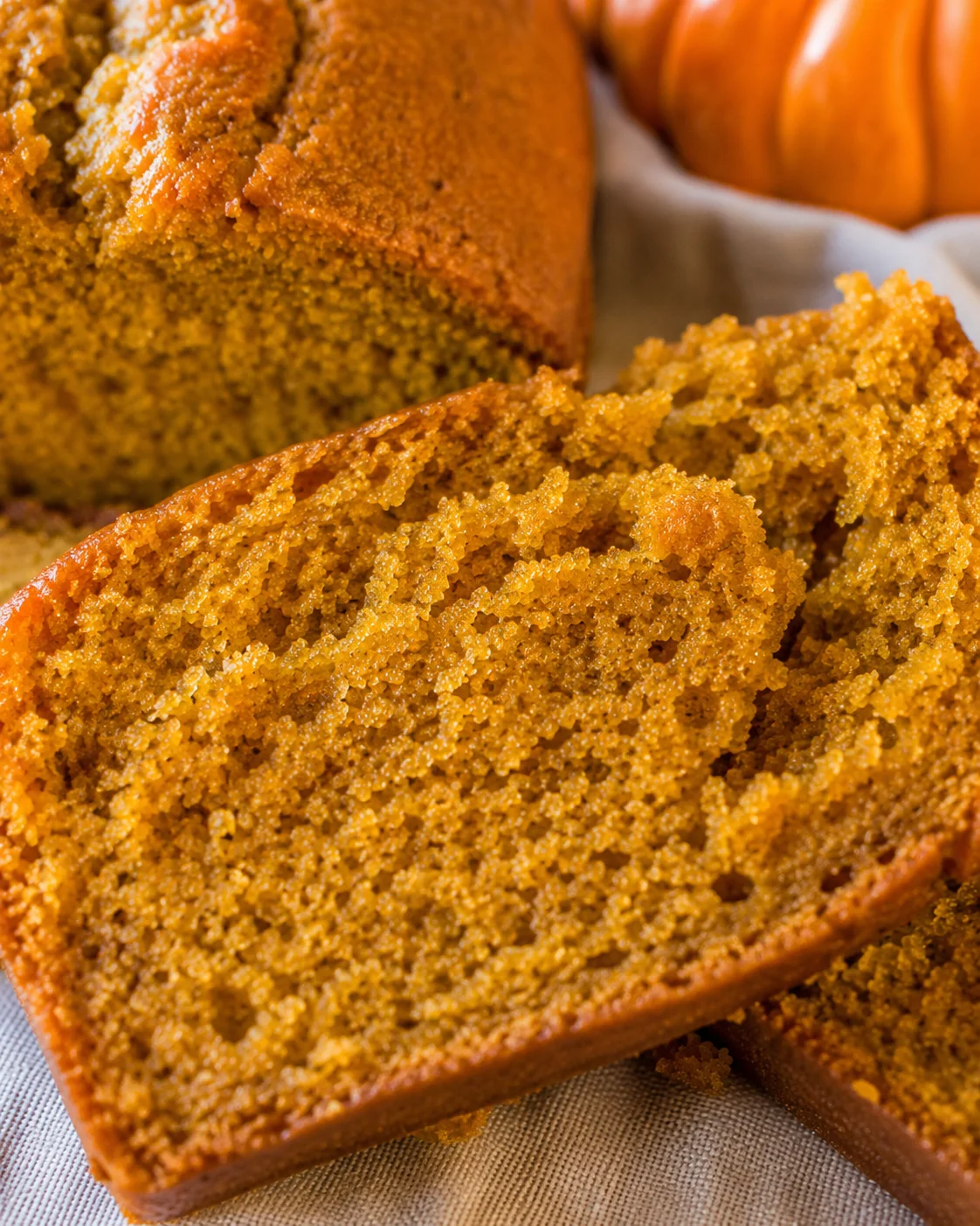 Close-up detail of pumpkin bread interior showing moist crumb texture